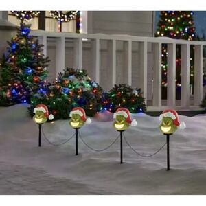 Gemmy Christmas Grinch Battery-Operated Pathway Stakes (4 Count) With Santa Hat‎